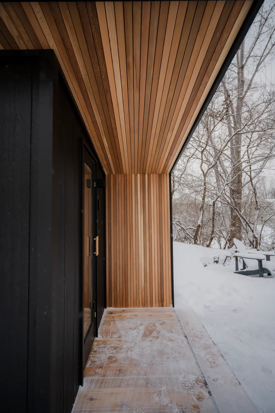 Clear cedar soffit and entry wall on the Tuli sauna